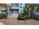 Exterior view of building with two palms trees flanking the front at 9540 Shore Dr. # 1N, Myrtle Beach, SC 29572