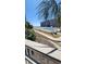 Exterior view of building with pool, fences, palm trees and an ocean view at 9540 Shore Dr. # 1N, Myrtle Beach, SC 29572