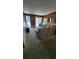 Inviting living room with a large window, wood paneling, and comfortable furniture at 9540 Shore Dr. # 1N, Myrtle Beach, SC 29572