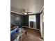 Neutral bedroom with wood-look floors, ample natural light, and a ceiling fan at 972 Mount Carmel Rd., Hemingway, SC 29554