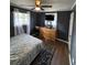 Cozy bedroom with sleek floors, soft lighting, and a dresser at 972 Mount Carmel Rd., Hemingway, SC 29554