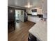 Functional kitchen featuring updated countertops, white cabinets, and stainless appliances at 972 Mount Carmel Rd., Hemingway, SC 29554
