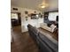 Cozy living room with wood-look floors, decorative signs, and comfortable seating at 972 Mount Carmel Rd., Hemingway, SC 29554