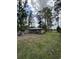 Exterior view of the rear of home with view to field at 972 Mount Carmel Rd., Hemingway, SC 29554