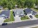 Aerial view of a charming neighborhood showcasing well-maintained homes, lush greenery, and a peaceful residential setting at 1010 Graybill Lane, North Myrtle Beach, SC 29582