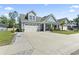 Charming home featuring a two-car garage, and a well-maintained lawn, showcasing its inviting curb appeal at 1010 Graybill Lane, North Myrtle Beach, SC 29582