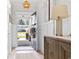 Bright foyer with wood floors, wainscoting, and a charming view of the outdoors at 1010 Graybill Lane, North Myrtle Beach, SC 29582