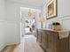 Elegant foyer featuring wainscoting, hardwood floors, and tasteful decor at 1010 Graybill Lane, North Myrtle Beach, SC 29582