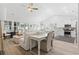 Open-concept living room and kitchen, featuring vaulted ceilings and stylish decor at 1010 Graybill Lane, North Myrtle Beach, SC 29582