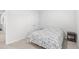 Simple bedroom with a comfy bed, side tables, neutral walls and carpet at 1015 Saltgrass Way, Myrtle Beach, SC 29588