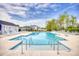 Relax and unwind at the community pool with lounge chairs and clear blue water at 1015 Saltgrass Way, Myrtle Beach, SC 29588