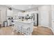 Modern kitchen with stainless steel appliances, granite countertops, and a large center island at 1015 Saltgrass Way, Myrtle Beach, SC 29588