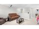 Cozy bonus room with comfortable seating and a projector screen for entertainment at 1015 Saltgrass Way, Myrtle Beach, SC 29588
