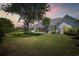 Expansive backyard featuring a patio and lush lawn, ideal for outdoor living and entertaining at 1028 Whooping Crane Dr., Conway, SC 29526