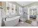 Beautiful bathroom with a soaking tub, glass shower, and elegant fixtures, perfect for relaxation at 1028 Whooping Crane Dr., Conway, SC 29526