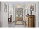 Inviting entryway with double doors, wood floors, and decorative accents at 1028 Whooping Crane Dr., Conway, SC 29526