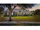Charming one-story home with stone and siding, with warm lights at dusk at 1028 Whooping Crane Dr., Conway, SC 29526