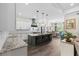 Spacious open kitchen with granite counters, stylish island with seating, and stainless steel appliances at 1028 Whooping Crane Dr., Conway, SC 29526