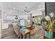 Bright living room with coffered ceilings, a fireplace, and sliding glass doors leading to the outdoor space at 1028 Whooping Crane Dr., Conway, SC 29526