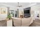 Cozy living room featuring a modern fireplace, stylish decor, and sliding glass doors at 1028 Whooping Crane Dr., Conway, SC 29526