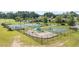 Community playground with tennis and basketball courts, offering recreational activities for all ages at 1028 Whooping Crane Dr., Conway, SC 29526