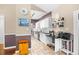 Contemporary kitchen boasts white cabinets, granite countertops, and stainless steel appliances at 106 Willow Ridge Rd., Myrtle Beach, SC 29588
