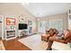 Inviting living room with vaulted ceilings, hardwood floors, and ample natural light at 106 Willow Ridge Rd., Myrtle Beach, SC 29588