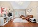 Bright living room featuring hardwood floors and a vaulted ceiling with a ceiling fan at 106 Willow Ridge Rd., Myrtle Beach, SC 29588