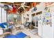 Enclosed outdoor living space with comfortable seating and views of the surrounding property at 106 Willow Ridge Rd., Myrtle Beach, SC 29588