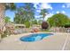 Backyard pool with lounge chairs and fenced-in yard at 106 Willow Ridge Rd., Myrtle Beach, SC 29588