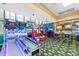 Well-lit game room with a variety of arcade machines providing entertainment for all ages at 1105 S Ocean Blvd. # 630, Myrtle Beach, SC 29577