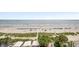 Beautiful beach front with beach access, palm trees and blue umbrellas at 1105 S Ocean Blvd. # 630, Myrtle Beach, SC 29577