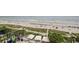 Breathtaking beach front with ocean access, green vegetation and sun umbrellas at 1105 S Ocean Blvd. # 630, Myrtle Beach, SC 29577