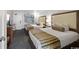 Cozy bedroom featuring two queen-sized beds with striped bedding, lamps, and neutral decor at 1105 S Ocean Blvd. # 630, Myrtle Beach, SC 29577