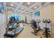 Well-equipped gym with treadmills, weights, and elliptical machines, offering a comprehensive fitness experience at 1105 S Ocean Blvd. # 630, Myrtle Beach, SC 29577