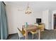 Well-lit living area with dining table, tv, and modern furnishings at 1105 S Ocean Blvd. # 630, Myrtle Beach, SC 29577