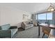 Cozy living room featuring water views, modern furnishings, and natural light at 1105 S Ocean Blvd. # 630, Myrtle Beach, SC 29577