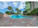 Stunning view of the outdoor pool area with a tiled lazy river feature and a beautiful building exterior at 1105 S Ocean Blvd. # 630, Myrtle Beach, SC 29577