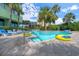 Relaxing outdoor pool area with lounge chairs, floats, and beautiful palm trees for a resort-like experience at 1105 S Ocean Blvd. # 630, Myrtle Beach, SC 29577