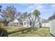 Spacious backyard view, complete with a screened porch, storage shed, and hot tub at 113 Edwards Ln., Longs, SC 29568