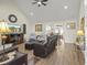 Bright living room with vaulted ceilings, hardwood floors, and an open floor plan at 113 Edwards Ln., Longs, SC 29568
