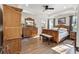 Spacious main bedroom with hardwood flooring, tray ceiling, and neutral paint at 113 Edwards Ln., Longs, SC 29568