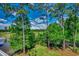 Lush green landscape with a golf course visible through a canopy of trees at 116 Cypress Point Ct. # 302, Myrtle Beach, SC 29579