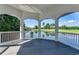 Scenic view from the gazebo overlooking a tranquil pond with a golf course in the distance at 116 Cypress Point Ct. # 302, Myrtle Beach, SC 29579