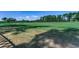 Beautiful green golf course view with mature trees and pristine manicured grass on a clear day at 116 Cypress Point Ct. # 302, Myrtle Beach, SC 29579
