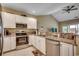 Spacious kitchen featuring stainless appliances, granite countertops, and white cabinetry at 116 Cypress Point Ct. # 302, Myrtle Beach, SC 29579