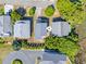 Overhead view showcasing a charming home with outdoor deck in a lush, private setting at 118 Seaside St., Holden Beach, NC 28462