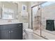 Modern bathroom featuring gray tones, glass enclosed shower, and chrome fixtures at 1211 Arezzo Ave., Myrtle Beach, SC 29572