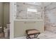 Bathroom with tiled shower, brushed nickel hardware, and a built-in bench seating at 1211 Arezzo Ave., Myrtle Beach, SC 29572