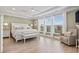 Spacious bedroom with tray ceilings, hardwood floors, recessed lighting and ample natural light at 1211 Arezzo Ave., Myrtle Beach, SC 29572